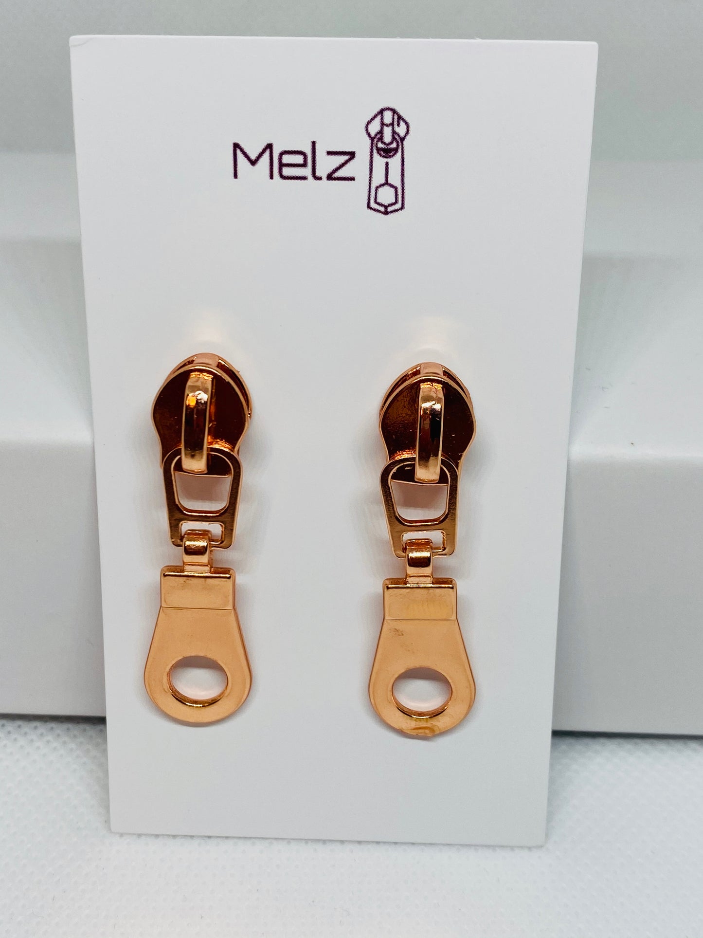 Rose gold round zipper pull earrings