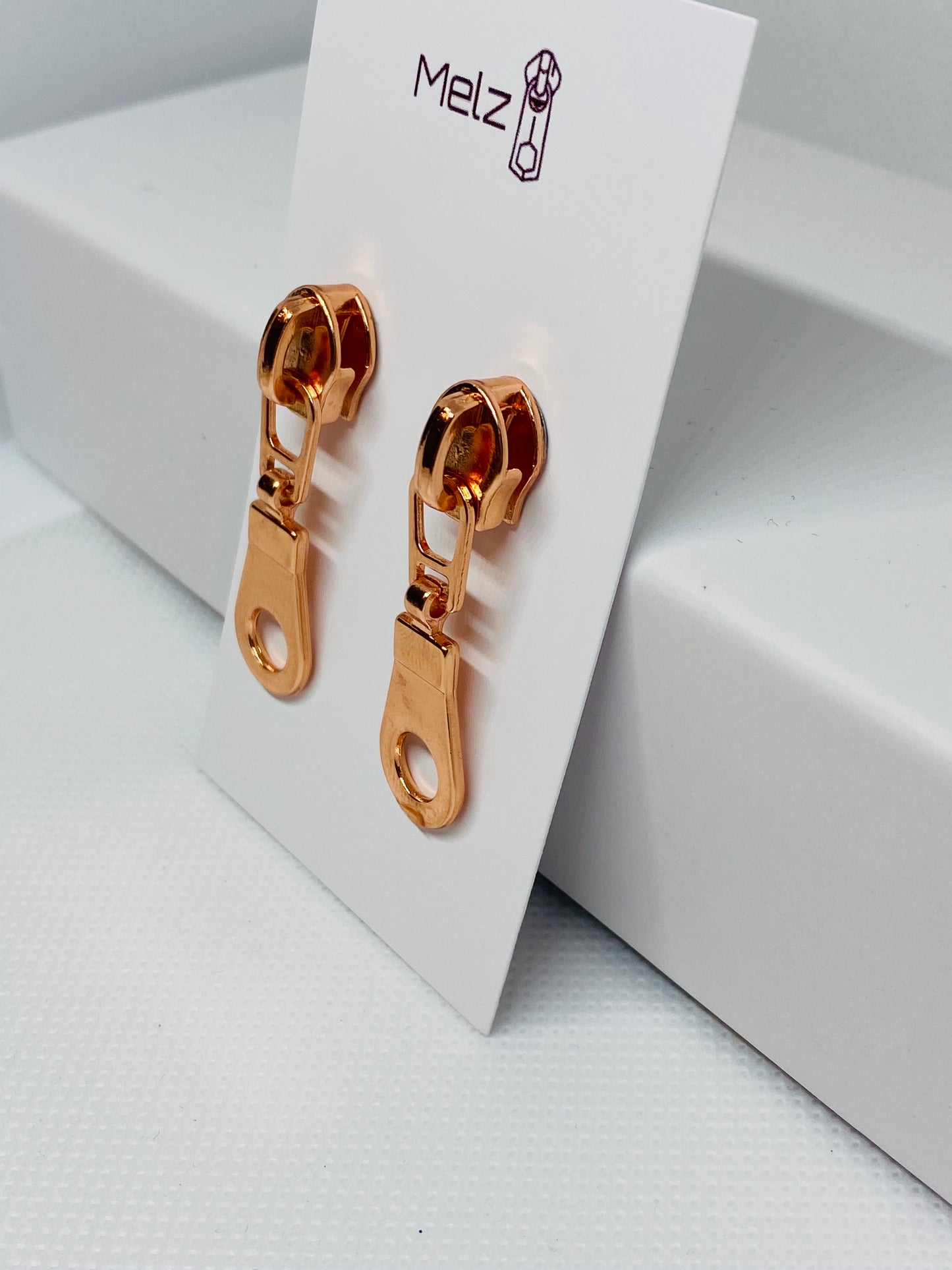 Rose gold round zipper pull earrings