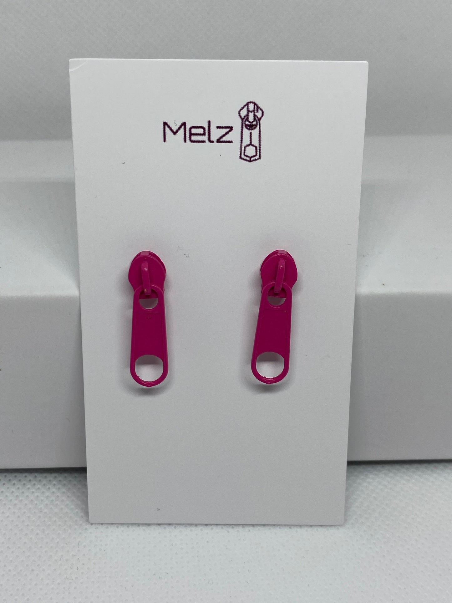 Hot pink zipper earrings