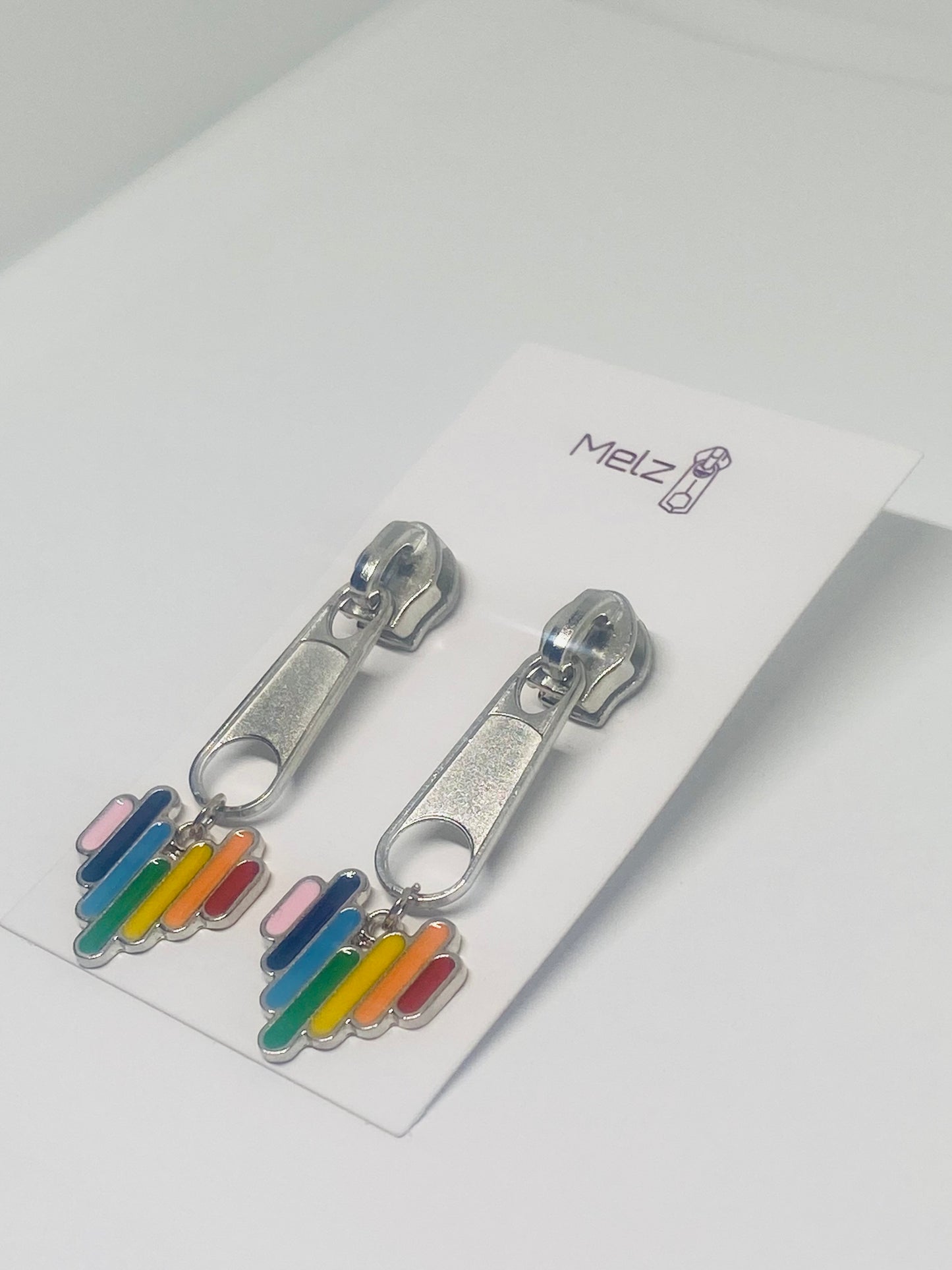Silver zippers striped rainbow hearts